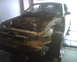 1999 Ford Mustang - Front end of a 1999 Ford Mustang removed to access the engine bay.