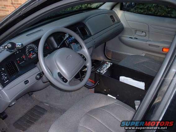 1998 Ford Crown Victoria interior showing dashboard, steering wheel, and center console
