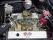 1964 Chevrolet Corvette - Close-up of a Corvette engine bay, a carburetor and MSD ignition system.