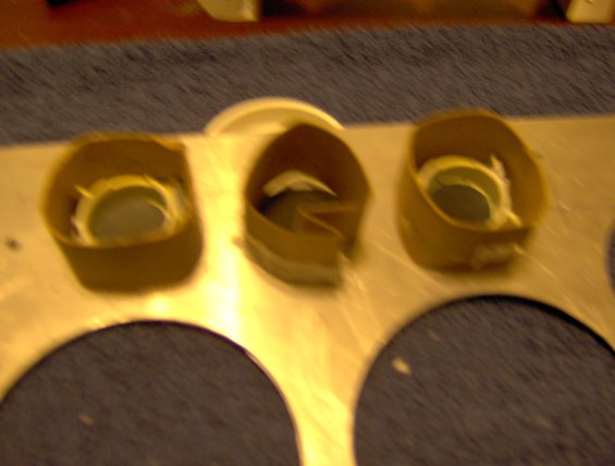 127.jpg using an empty toilet-paper cardboard tube to go around each light 