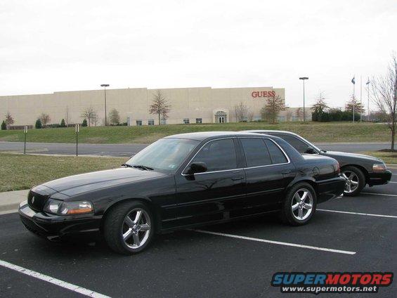2003 Mercury Marauder and another sedan parked in a lot