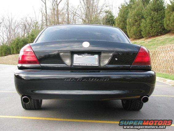 Black 2003 Mercury Marauder rear view with dual exhaust pipes
