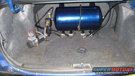 Trunk with blue air tank and compressor for air suspension