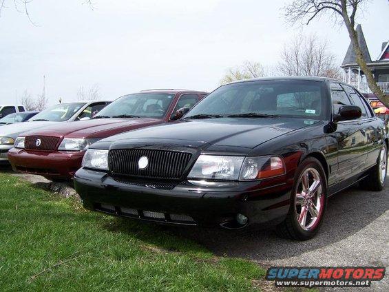 Black 2003 Mercury Marauder front grille and chrome wheels