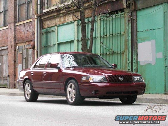 Red 2003 Mercury Marauder 3q-front view parked on street