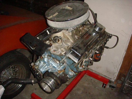 The motor that is going in.  Needs to be repainted and detailed.  Block is a '69 casting, heads are off of a '72.  Has Keith Black forged flat-top pistons, Edelbrock Performer EPS intake, Comp 1.6 roller rocker arms, and a Lunati Voodoo 262/268 cam.