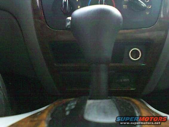 Gotta love that floor shifter and wood trim!