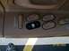 1995 Mercury Grand Marquis - Interior view of car door controls, including window lock and power window buttons.
