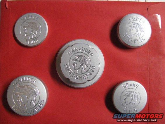 caps.jpg I chose Colex Customs'  cap covers to dress up the engine bay. 

http://colexcustoms.com/

I went with the bead blasted finish to match the factory intake's finish. 

Note: These pics were taken before the first engine detail. Hence, the dirt and dust. 