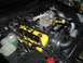 2003 Mercury Marauder - Engine bay yellow valve covers and a prominent supercharger, with visible hoses and wiring.