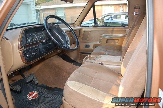 Tan interior of 1989 Ford Bronco with bucket seats and dashboard
