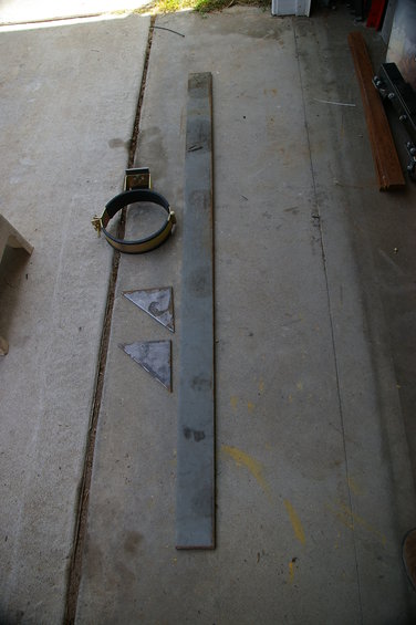 Tank rack clamp and metal pieces on concrete