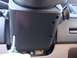 1996 Ford Bronco - Steering column cover with a screwdriver being used for removal.