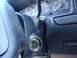 1996 Ford Bronco - Close-up of a vehicle's interior, focusing on the steering column and dashboard gauges. The ignition cylinder and a 'Rear Def' button are v…