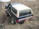 1990 Ford Bronco - This 1990 Ford Bronco navigates a muddy off-road trail with its snorkel engaged.