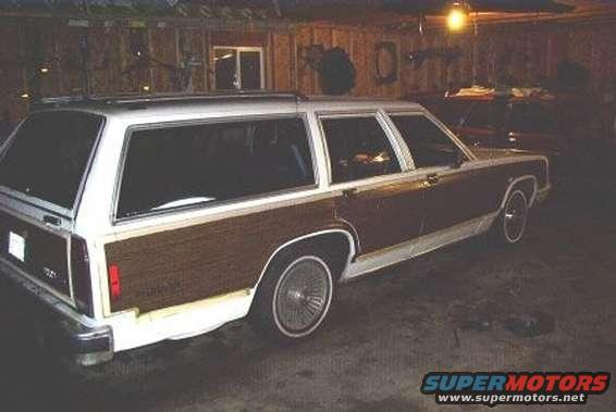 From the rear, no damage but note the trim is missing the wood overlay.