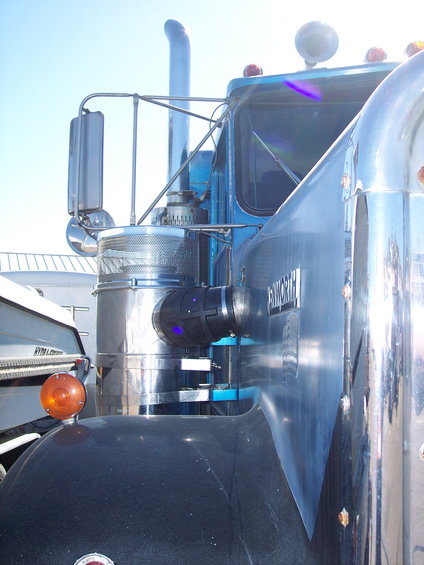 1981 Kenworth W900A truck's chrome exhaust stack and air cleaner assembly