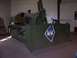 1990 Ford Bronco - A military bulldozer is displayed indoors, showing its front blade with a crest.