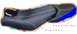 1994 Ford Bronco - A black motorcycle seat with a carbon fiber pattern and a blue accent is shown.
