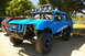 1986 Ford Bronco - Modified 1986 Ford Bronco with "Black Market Offroad" graphics and extensive roll cage.