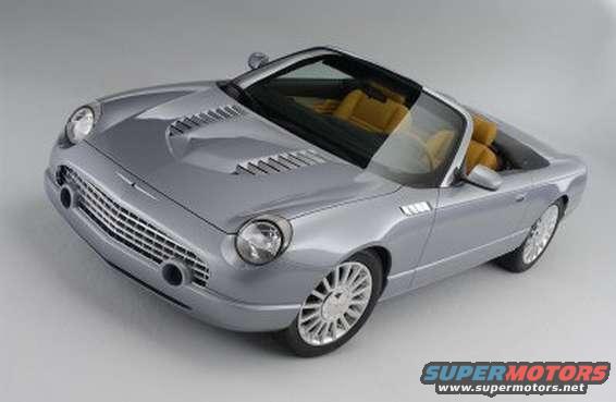 Silver convertible with tan interior, front quarter view