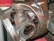 1994 Ford Bronco - Close-up view of a damaged driveshaft universal joint, with the word 'Broke' circled in red.