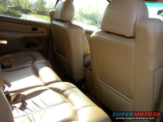Tan leather seats and door panel inside a 2000 Chevrolet Suburban