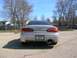 1994 Mazda MX-6 - Rear view of a silver 1994 Mazda MX-6 parked in a lot.