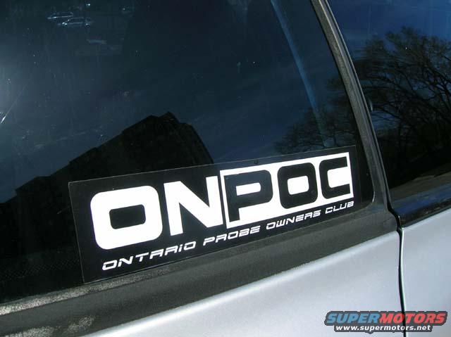 Close-up of a sticker on a car window that says ONPOC ONTARIO PROBE OWNERS CLUB