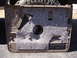 1996 Ford Bronco - Interior view of a car door panel, showing insulation and a speaker cutout.