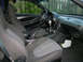 1993 Ford Probe - The interior of a car is visible, including the seats, dashboard, and steering wheel.