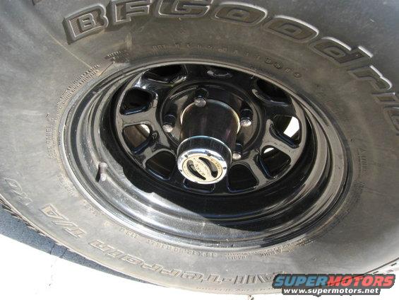 BFGoodrich tire and black rim with chrome hub
