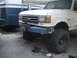 1989 Ford Bronco - Front view of a white 1989 Ford Bronco equipped with a winch mount.