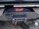 1989 Ford Bronco - Close-up of a winch mount with a Mile Marker bag visible.