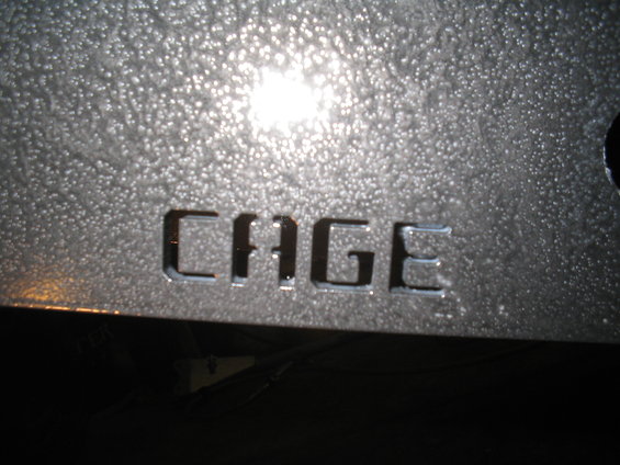 Metal panel with CAGE cut out