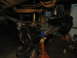 1979 Ford Bronco - The front axle assembly of a vehicle is shown supported by jack stands in a garage setting.