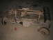 1979 Ford Bronco - Two vehicle axles are laid out on the ground, possibly for repair or modification.