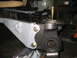 1979 Ford Bronco - This image shows a close-up of a vehicle's suspension system, focusing on mechanical parts and hardware.