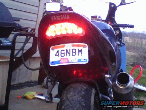 Rear of a Yamaha motorcycle with a license plate that reads 46NBM