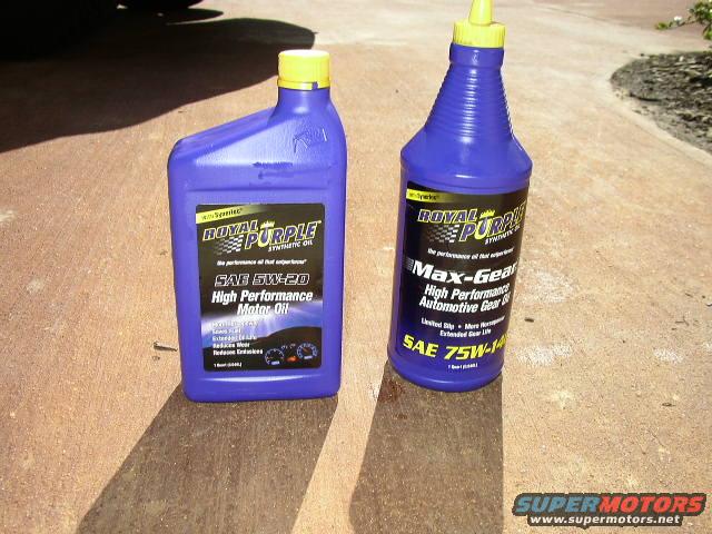 Two bottles of Royal Purple synthetic oil: SAE 5W-20 High Performance Motor Oil and SAE 75W-140 Max-Gear High Performance Automotive Gear Oil
