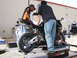2006 Honda CBR-RR - A motorcycle is being prepared for testing on a dynamometer, with two individuals observing the process.