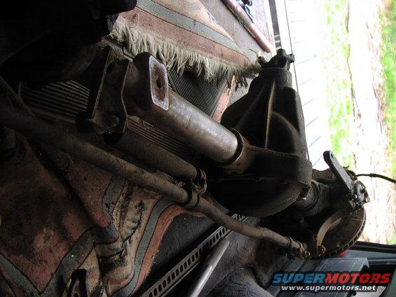 Rear axle assembly with leaf springs and suspension components, viewed from below