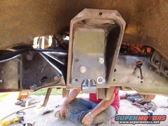 p4210014.jpg Only 3 bolts on this side. I will probley but the bottom one in when I fix the steering box but I could not get to it now.