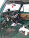 1979 Ford F-150 - The interior of a 1979 Ford F-150 shows a disassembled dashboard with exposed wiring and gauges.
