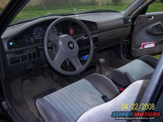 Car interior shot showing dashboard, steering wheel, seats, and gear shift. Date stamp reads 04/22/2008