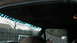 1990 Ford Bronco - Interior view of a vehicle, with a sticker on the windshield visible.