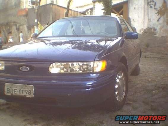 1995 Ford Taurus front quarter view, blue paint, license plate BRE 0098