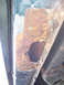 1995 Mercury Grand Marquis - Significant rust damage is visible on the vehicle's frame, indicating structural compromise.