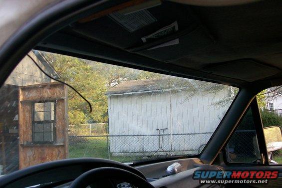 100_1997.jpg I didn't get before pictures, but I had one of those shelfs and windshield tint on this thing.  Those were the first to go, plus I relocated the rearview mirror up higher.