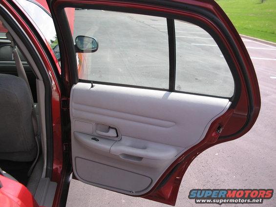 2001 Ford Crown Victoria interior door panel and rear door open
